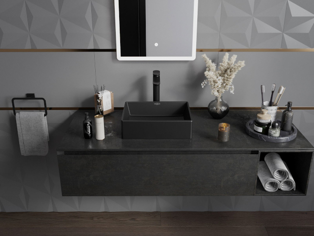 Dulap negru sub chiuvetă stilat în aranajamentul băii